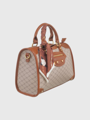 MONOGRAM SCULPTED BARREL BAG